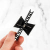 12 Piece Butterfly Hair Sectioning Clips held in hand, designed for securing hair during styling.