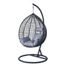 Grey Garden Outdoor Hanging Chair suspended with a sleek black frame and plush grey cushions, perfect for outdoor relaxation.