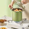 Japanese-Style Non-Stick Deep Fryer and Noodle Pot cooking on a stove with ingredients visible inside.