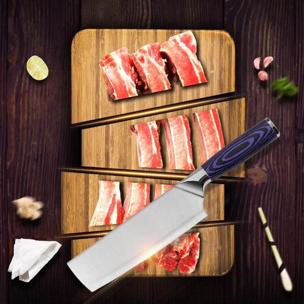 Multi-Purpose Japanese Kitchen Chef Knife on a wooden cutting board with sliced meat.