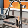 Brushed Grey Stainless Steel Pull Out Kitchen Faucet shown in a modern kitchen setting with sleek design.