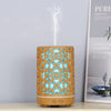 200ml Automatic Electric Plastic Aroma Diffuser emitting mist with decorative design and ambient light