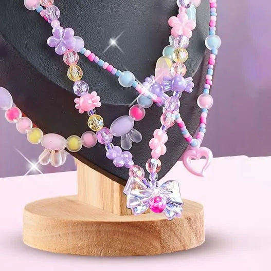 Colorful beaded necklaces displayed on a stand, part of the 3-in-1 DIY Beaded Jewelry Making Set.