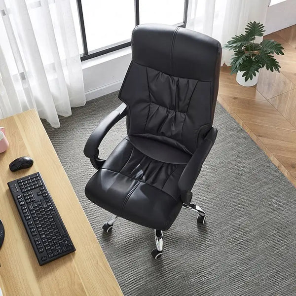 High-Back Reclining Boss Ergonomic Office Chair in a modern workspace with a keyboard and mouse.