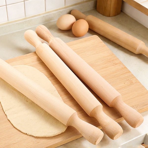 Wooden Rolling Pin on a kitchen countertop with eggs and rolled dough for baking.