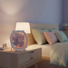 Fresh Color Box Desk USB Fan Rechargeable Cooling Fan on bedside table in a cozy bedroom setting.