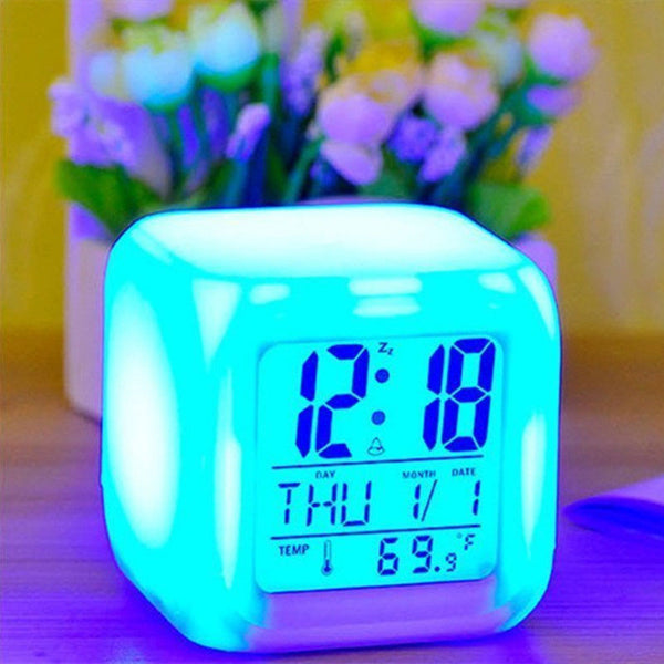 Color Change Digital Alarm Clock displaying time and temperature in vibrant blue light.