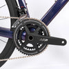Close-up of the crankset on the 2nd Generation 24-Speed Flat Bar Road Bike, showcasing its durable components.