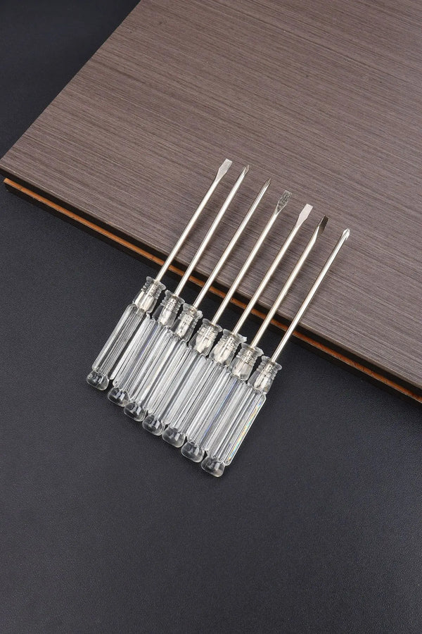 A set of Crystal Magnetic Cross Word Screwdrivers arranged neatly on a wooden surface.