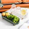 Household Kitchen Chopsticks Draining Tray with fruits and drinks on a stylish table.