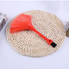 High Quality Plastic Duster on a woven mat, ideal for cleaning dust from tight spaces and delicate surfaces.