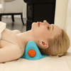 A woman relaxing with the EMS Heat Vibrating Back and Neck Massage Pillow for soothing neck relief.