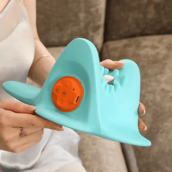Close-up of the EMS Heat Vibrating Back and Neck Massage Pillow showing the handheld controller and soothing blue design.
