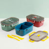 Kids Bento Lunch Box 1 L Plastic Lunch Container in multiple colors with utensils on a table.