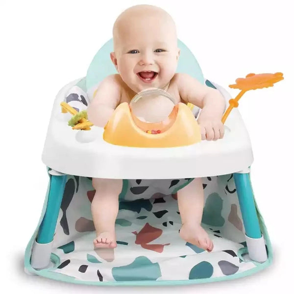 A happy baby enjoying playtime in a Multifunctional Baby Safety Feeding Chair with colorful toys.