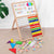 Multifunctional Wooden Magnetic Drawing & Writing Board with abacus and colorful learning shapes and letters.