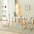 Modern Transparent Folding Chair set around a sleek dining table in a contemporary living space.