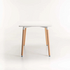 Betty Wooden Leg Dining Table with a modern design and wooden legs, perfect for compact dining spaces.