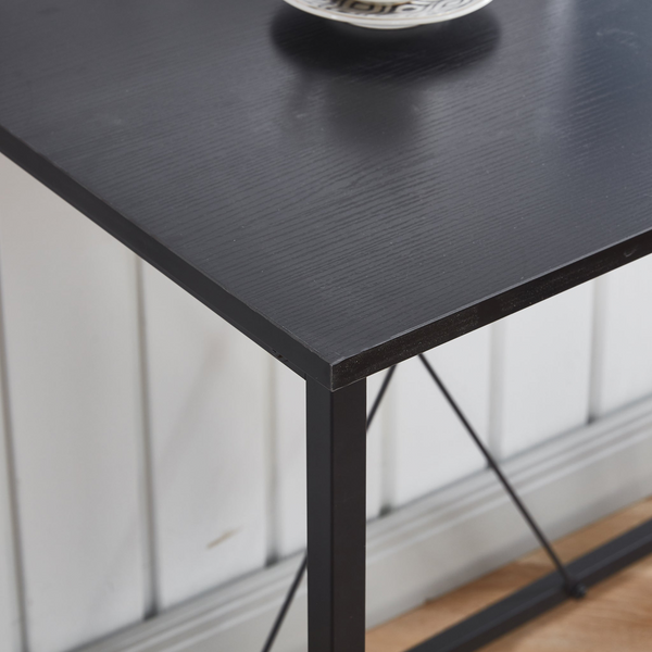 Close-up of the SD-23 L-Shaped Computer Gaming Desk showcasing the black surface and sleek design.