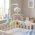 Rotating Musical Baby Crib Mobile with Projection featuring colorful hanging toys above a crib.