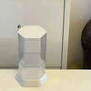 Rotating Hexagonal Acrylic Display Case featuring a 360-degree swivel and lockable design for collectibles.