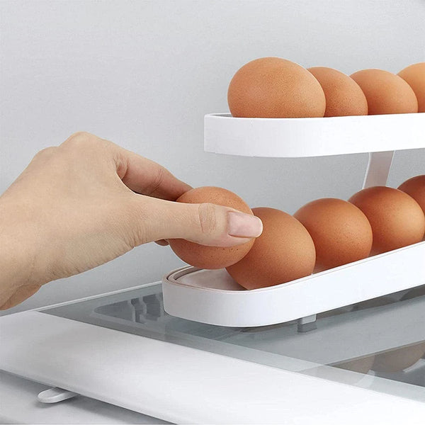Refrigerator Egg Rolling Organiser for Storage with eggs being placed in a stacked holder in the fridge.