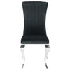 Black Velvet Upholstered Dining Chair with Silver Legs featuring a sleek design and polished chrome legs.