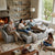 Family enjoying quality time on a 4 Seater Modular Fabric Sectional Sofa by the fireplace, with kids playing.
