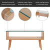 Eleonor Glass & Wood Coffee Table showcasing rounded corners, tempered glass top, and minimalist design with storage.