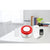 Smart Siren Alarm Home System with App displayed on a table, showcasing the siren and accessories.