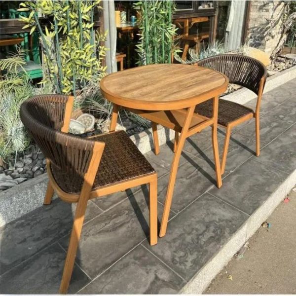 Space-Saving 3-Piece Outdoor Dining Set on a patio with two stylish chairs and a round table.