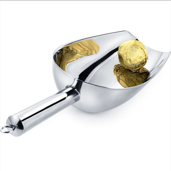 Stainless Steel Ice Scoop with golden foil-wrapped food, ideal for ice and dessert serving in kitchens or bars.