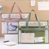 Transparent File Bag Document A4 Large in pink and green colors with visible contents for organization and protection.