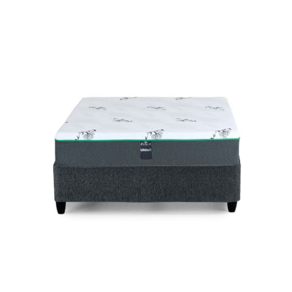 Ultra Plush Hybrid Mattress displayed on a stylish platform base, featuring a premium white top with graphic designs.