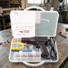 50W Plastic Welding Repair Stapler Kit with tools, staples, and instruction manual in a clear carrying case.