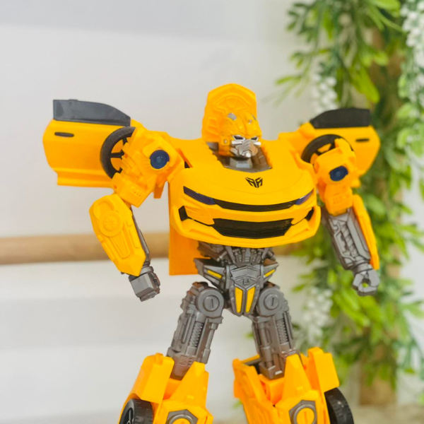 Sliding Transform Mini Robot Car Toy in its robot form, showcasing bright yellow and detailed features for playful adventures.