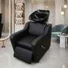 Professional Reclining Salon Shampoo Chair designed for client comfort with a modern aesthetic in a stylish salon environment.