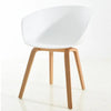 Modern White Dining Tub Chair featuring a smooth polypropylene seat and sturdy wooden legs.