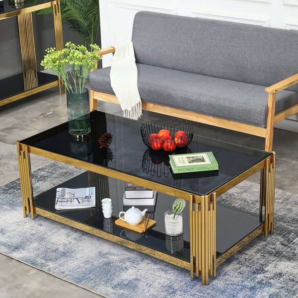 Designer Coffee Table with black surface and gold accents, serving as a stylish centerpiece in a modern living room.
