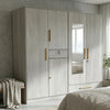 4-Door Wood Grain Wardrobe with Mirror and Gold Handles in a modern bedroom setting.