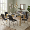 Black and Chrome 6 Seater Dining Table and Chair Set in a modern dining room with elegant decor.