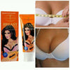Breast Enlarging Cream shown with packaging and measuring tape for size enhancement.