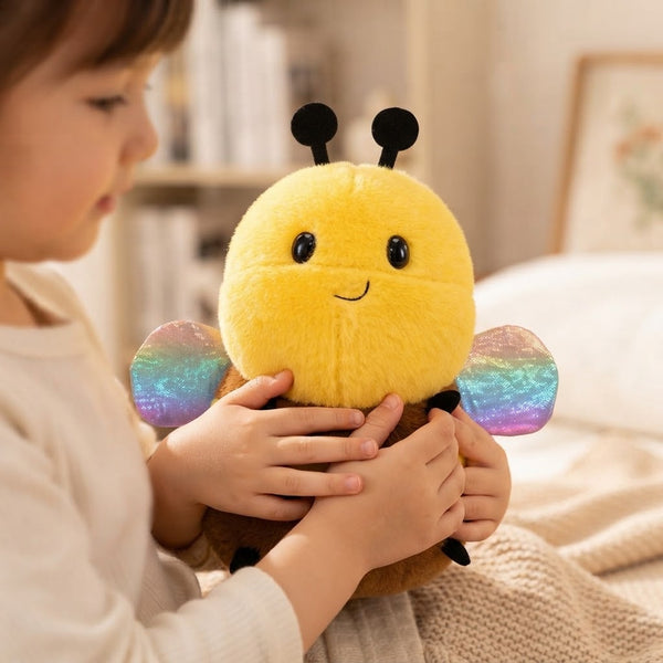 Child holding an 8-Inch Faux Mink Bee Plush Toy with colorful wings, showcasing its cute and soft design.