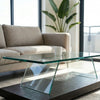 Modern Glass Top Coffee Table featuring a sleek glass surface and dark wood-look base in a stylish living room setting.