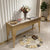 Luxury Stainless Steel Marble Entrance Table showcasing a stylish design with floral decor and a patterned rug.