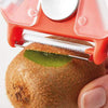 Using the 3 in 1 Peeler with Potato Eye Remover to peel a kiwi fruit.