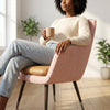 Modern Café Dining Chair in a bright room with a woman enjoying coffee while seated.