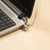 Close-up of a laptop with a Secure Laptop Security Cable Lock attached for protection.