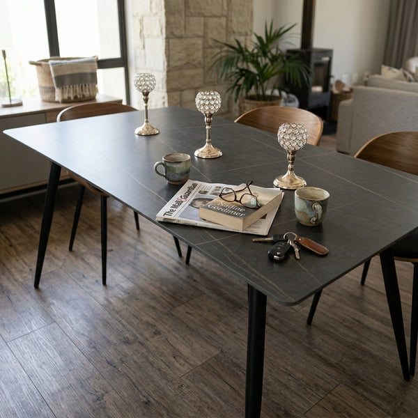 6 Seater Dining Table set with candles, mugs, and decorative items in a modern dining room setting.