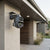 Dual-Lens PTZ Outdoor Security Camera mounted on a wall for enhanced perimeter surveillance.